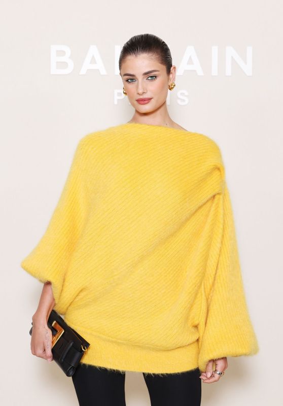 Taylor Hill Masters Parisian Edge in Balmain’s Bold Yellow Knit at Paris Fashion Week