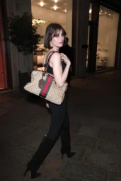 Alice Pagani in black cutout top and leggings at Gucci FW26 Dinner, Milan February 2026