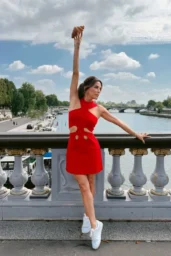 Eva Longoria posing in red Cult Gaia Lillie Knit Dress in Ghermez in Paris April 2026