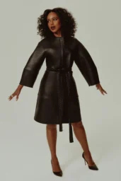 Kerry Washington posing in brown leather dress for Marie Claire April 2026 studio portrait
