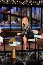 Linda Cardellini seated in cream lace top and pale green skirt on LIVE with Kelly and Mark March 18 2026