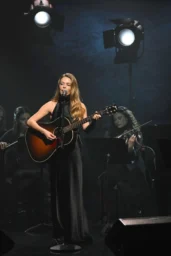 Maggie Rogers performing in black halter stage outfit at Ed Sullivan Theatre, April 1, 2026