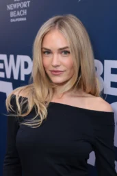 Michelle Randolph posing in a black off-shoulder mini dress at Newport Beach TV Fest in California, 2026