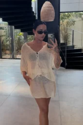 Demi Lovato in a cream L*Space crochet top and matching skirt in a June 10, 2026 mirror selfie