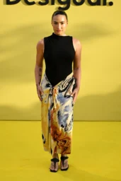 Demi Lovato in a Desigual printed dress and black heeled sandals at the Desigual Vintage launch in Ibiza